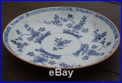 A Chinese Blue & White Dish with batavia brown underside cafe au lai Qianlong