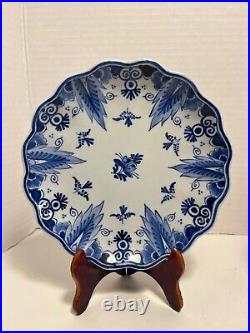A Pair of 1976 Royal Delft Blue Hand Painted Wall Hanging Plates Made in Holland