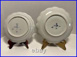 A Pair of 1976 Royal Delft Blue Hand Painted Wall Hanging Plates Made in Holland