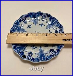 A Pair of 1976 Royal Delft Blue Hand Painted Wall Hanging Plates Made in Holland