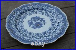 A antique chinese blue and white dish with molded rim period of Qianlong
