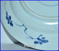 An elegant Chinese circa 1700 Kangxi period blue and white plate signed bottom
