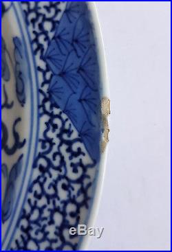Antique Chinese Blue And White Porcelain Plate Decorated With Dragons