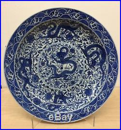 Blue and white 9 dragon plate. Qing Qianlong Mark