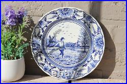 Vintage DELFT blue white pottery plate marked Spring season