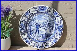 Vintage DELFT blue white pottery plate marked winter season
